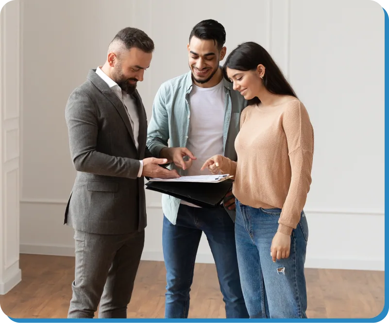 Family discussing a new home with an RG Unique Structures advisor